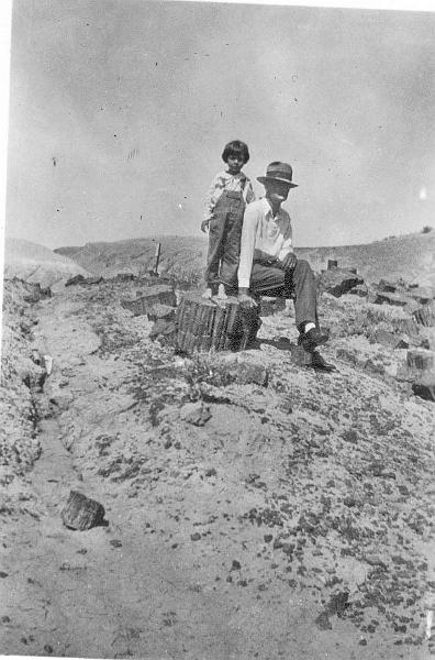 Ella Gene and Ed Speed.jpg - From left to right, Ella Gene Speed (daughter - 1925-1989) and her father, Edward Lewis Speed (1889-1973) at the petrified forest while on vacation to California to visit Ed's sister, Esther Speed Ingram.